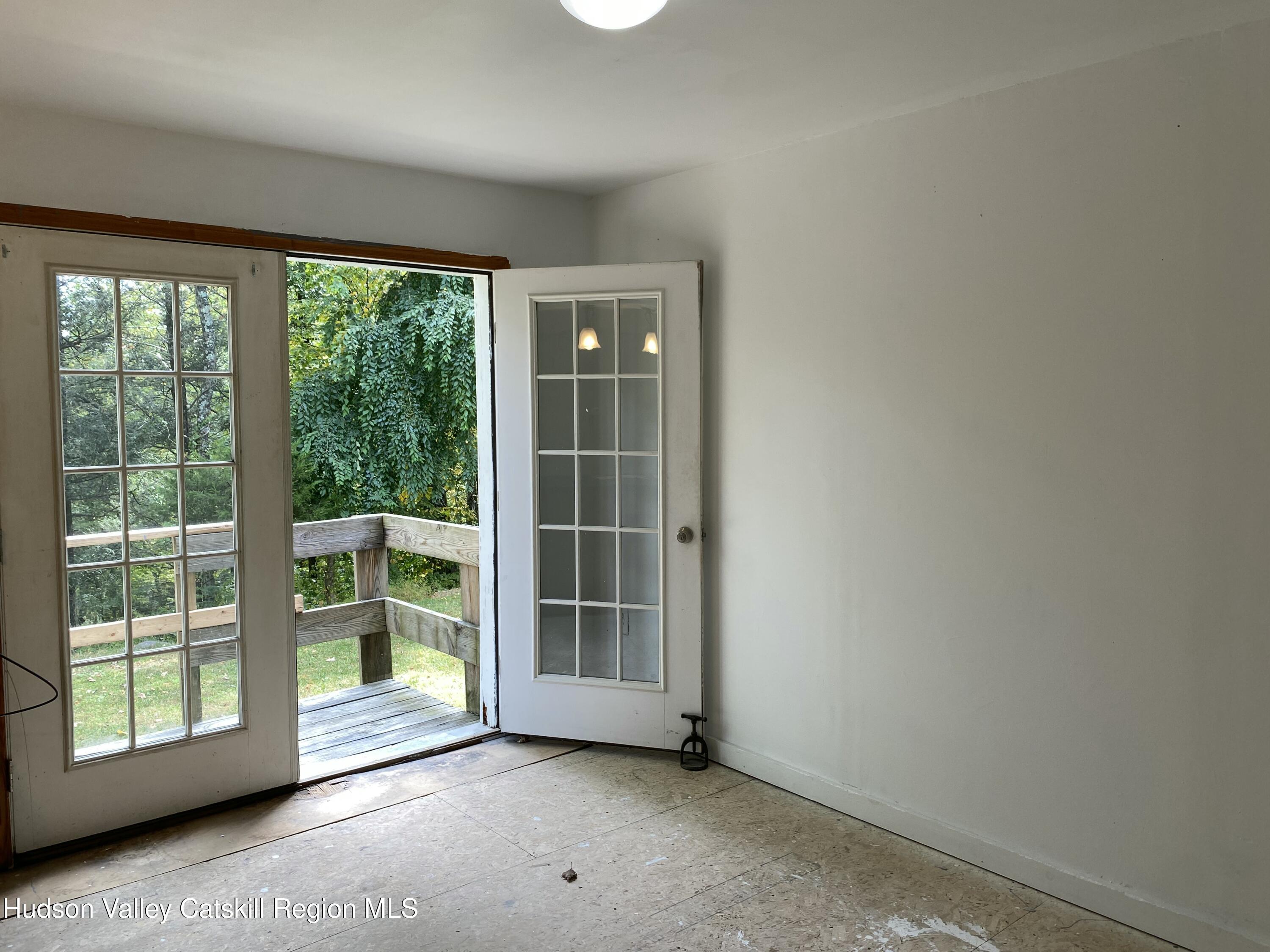 83 Buffalo Road Saugerties, NY 12477 - Photo 5 of 54 an empty room with windows