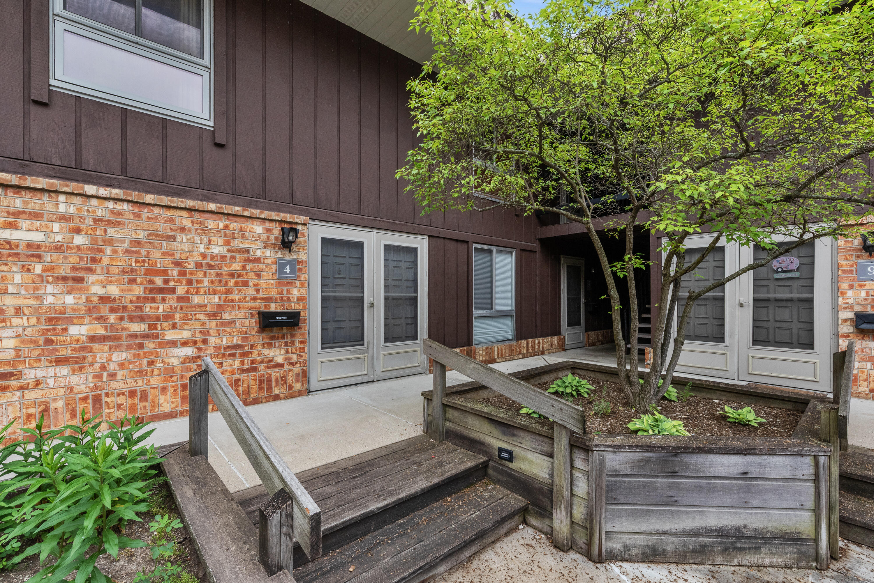 4155 West Rivers Edge Circle, Unit 4 Brown Deer, WI 53209 - Photo 11 of 18 Front door from the secured courtyard
