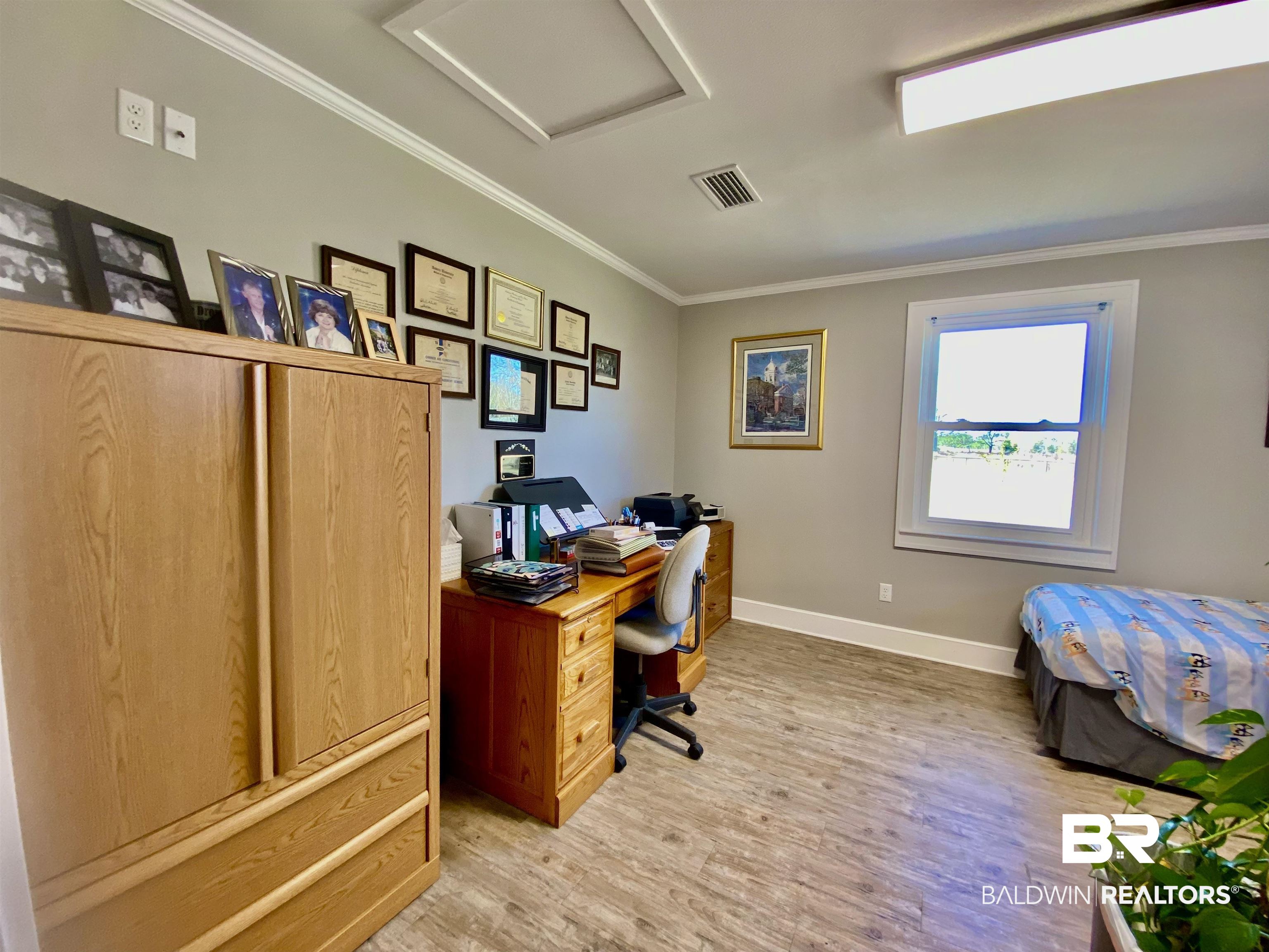 2711 County Road 5 Repton, AL 36475 - Photo 27 of 36 Office/ Bonus Room space featuring ornamental molding and light hardwood / wood-style flooring
