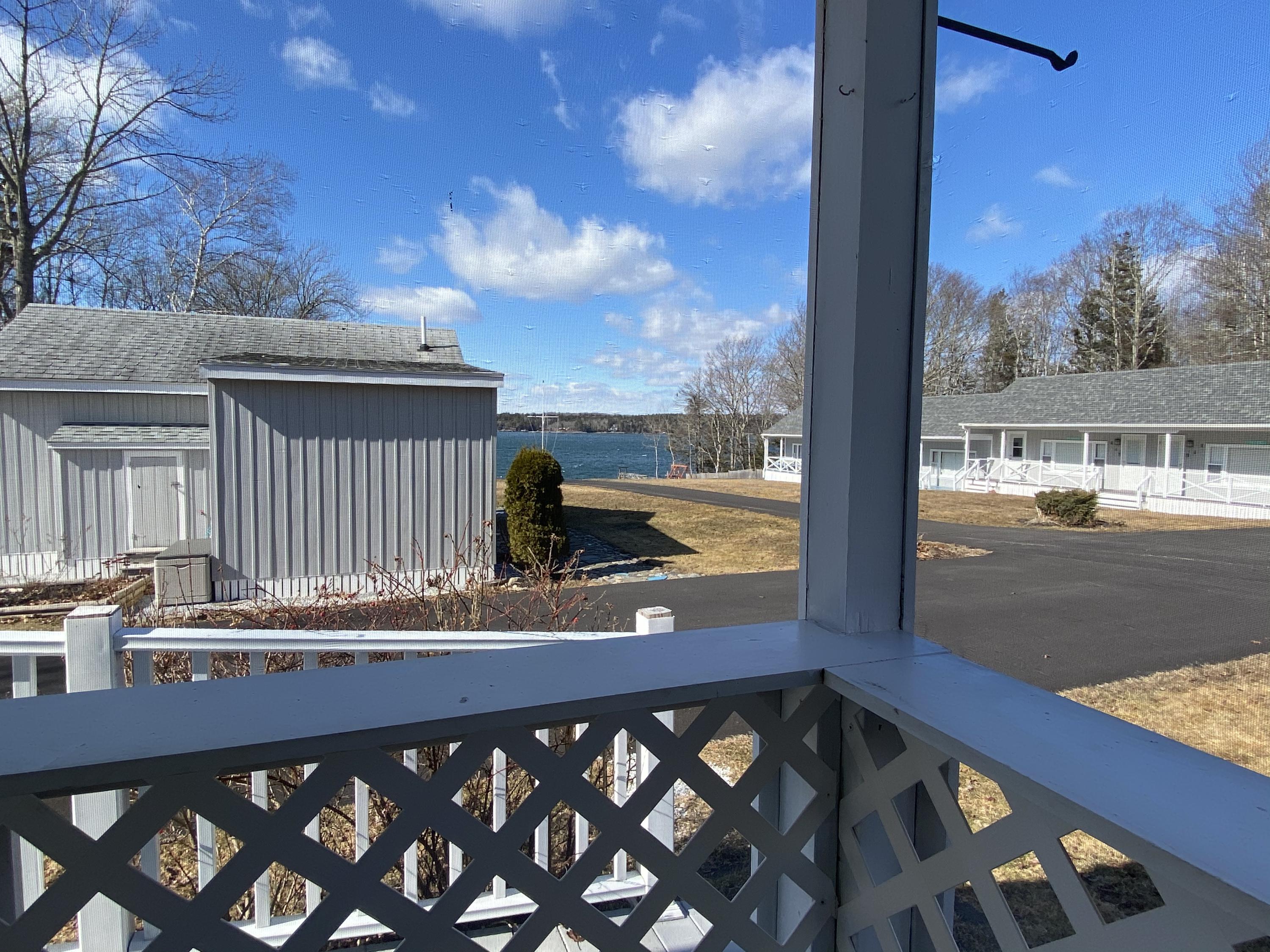 12 Wave Crest Lane, Unit C2 Boothbay, ME 04544 - Photo 22 of 31 Screened porch_Photo Feb 28, 11 32 50 AM