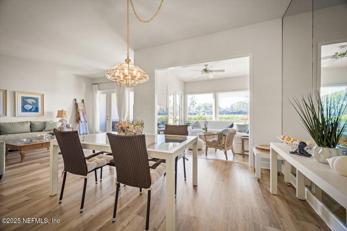 25 Tifton Way South Ponte Vedra Beach, FL 32082 - Photo 15 of 59 a view of a dining room with furniture window and wooden floor