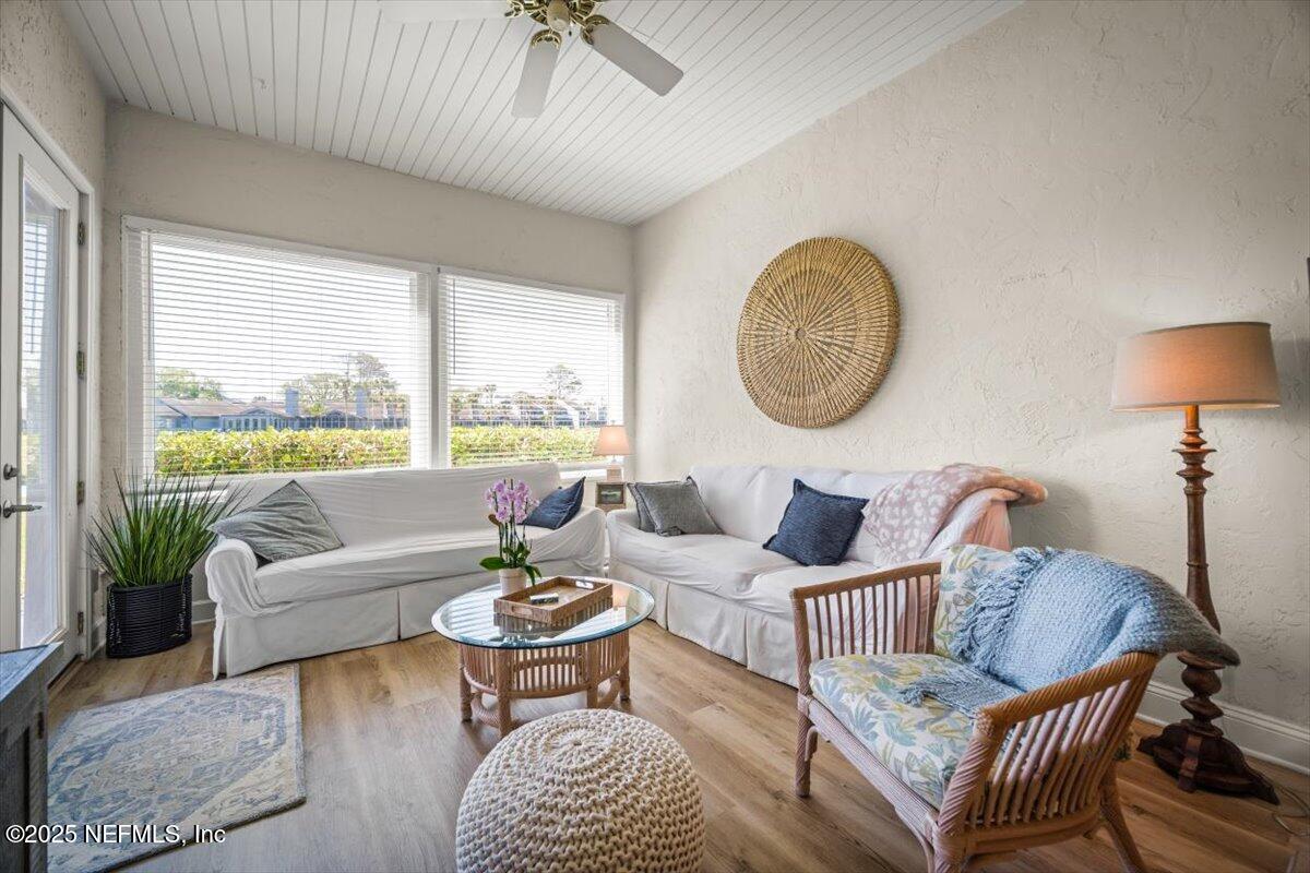 25 Tifton Way South Ponte Vedra Beach, FL 32082 - Photo 17 of 59 a living room with furniture and a large window