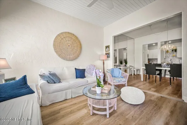 a kitchen with granite countertop a refrigerator stove and microwave