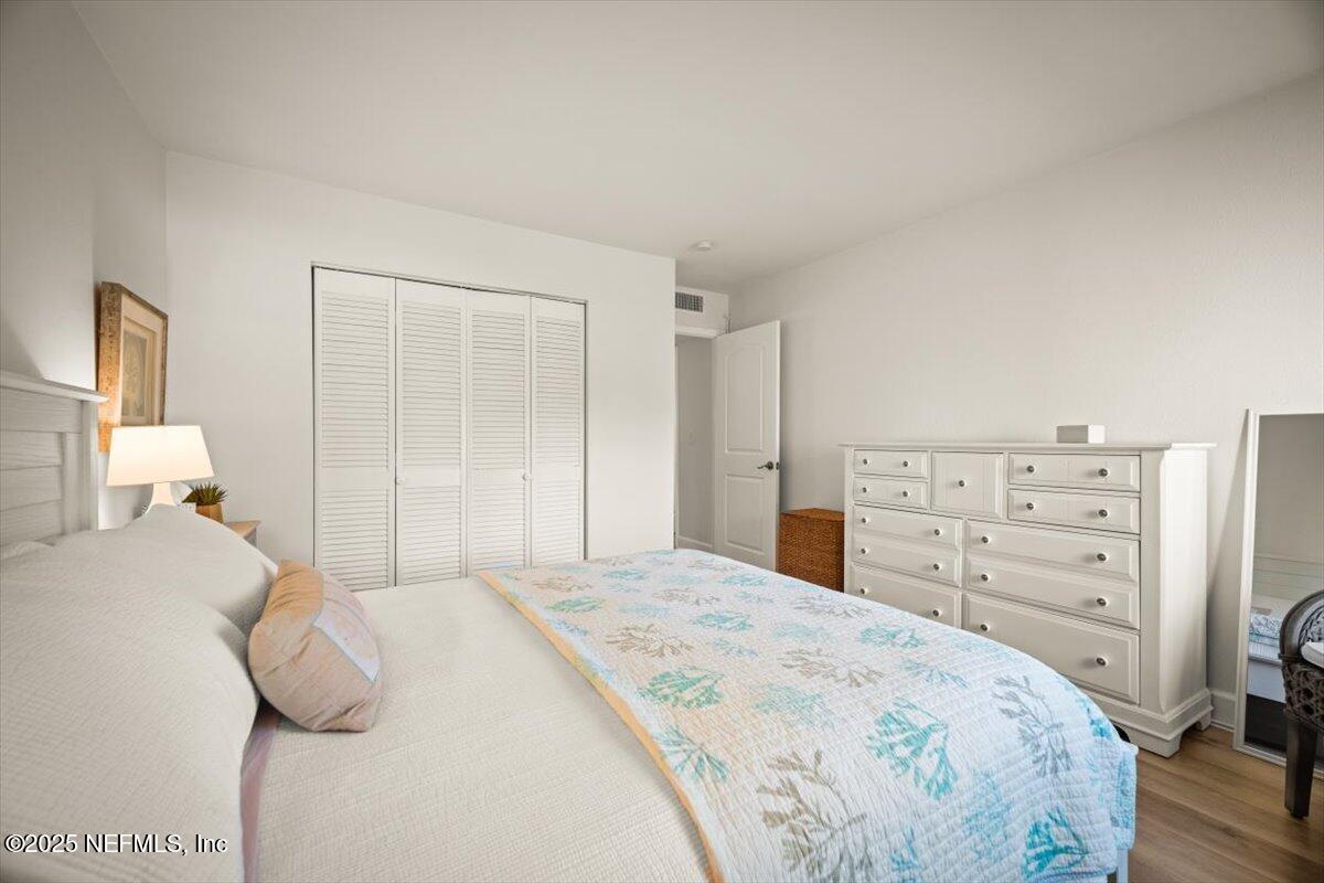 25 Tifton Way South Ponte Vedra Beach, FL 32082 - Photo 32 of 59 a bedroom with a bed and a dresser