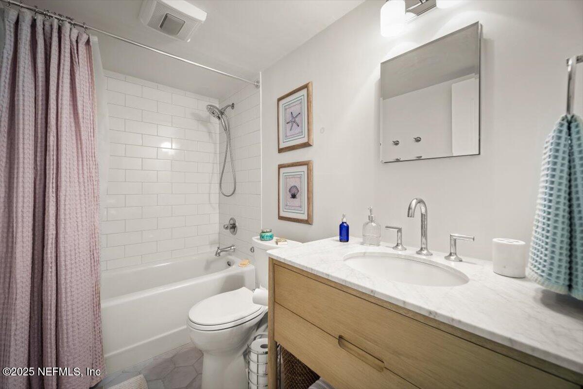 25 Tifton Way South Ponte Vedra Beach, FL 32082 - Photo 34 of 59 a bathroom with a granite countertop sink toilet and shower