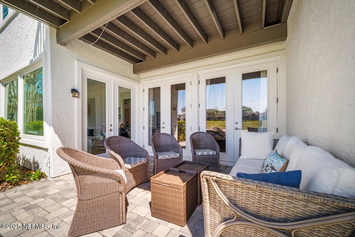 25 Tifton Way South Ponte Vedra Beach, FL 32082 - Photo 40 of 59 a living room with furniture