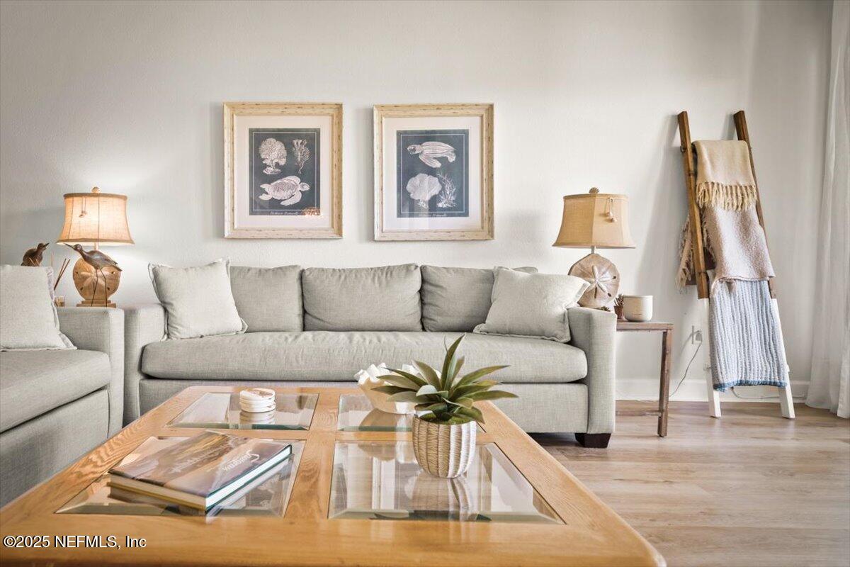 25 Tifton Way South Ponte Vedra Beach, FL 32082 - Photo 4 of 59 a living room with furniture and a wooden floor