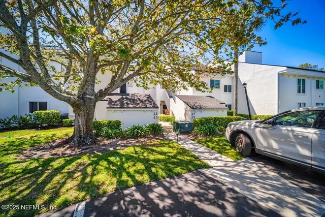 a view of a house with a swimming pool