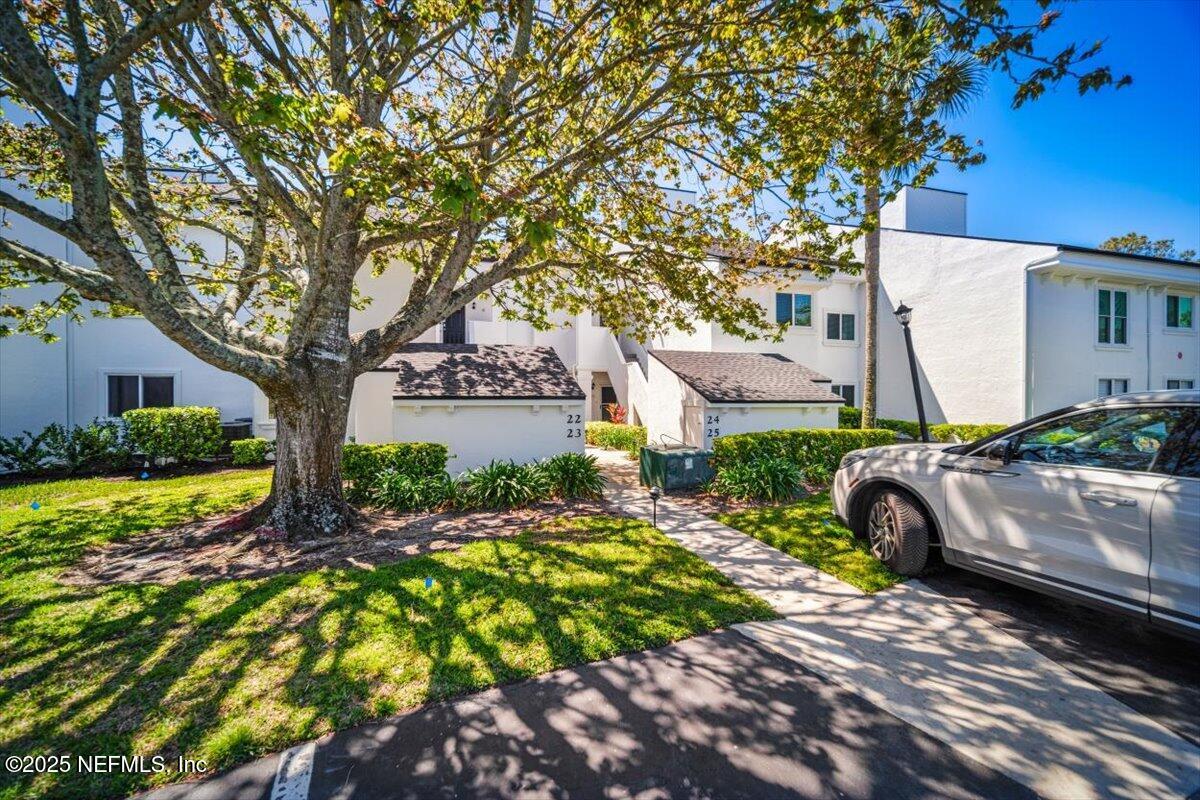 25 Tifton Way South Ponte Vedra Beach, FL 32082 - Photo 44 of 59 a view of backyard with swimming pool and outdoor seating
