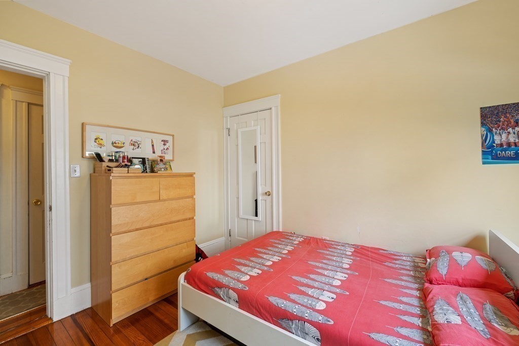 29 Worcester Street, Unit 1 Belmont, MA 02478 - Photo 18 of 27 a bedroom with a bed and a closet