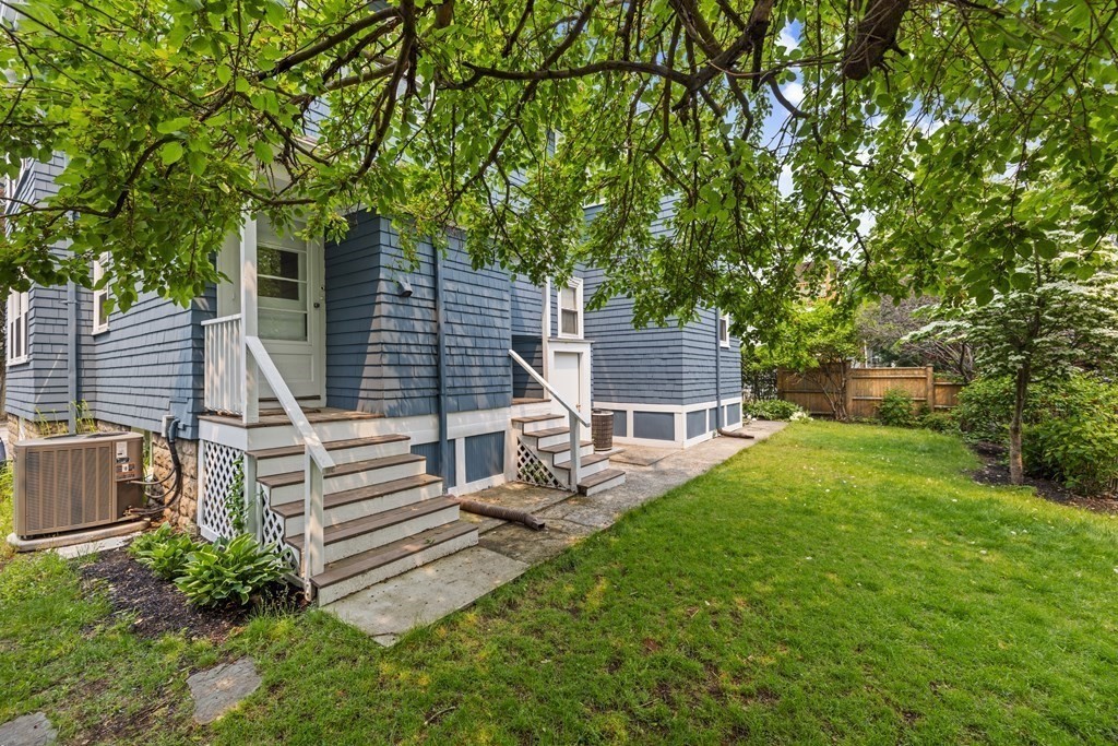 29 Worcester Street, Unit 1 Belmont, MA 02478 - Photo 26 of 27 front view of house with a yard