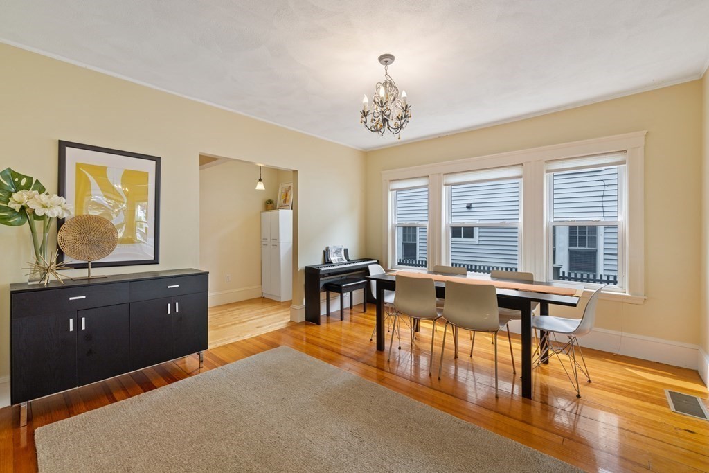 29 Worcester Street, Unit 1 Belmont, MA 02478 - Photo 7 of 27 a view of a dining room with furniture window and wooden floor