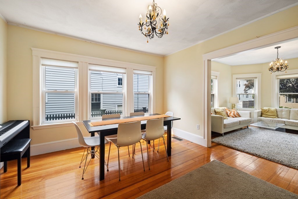29 Worcester Street, Unit 1 Belmont, MA 02478 - Photo 8 of 27 a view of a livingroom with furniture and a table