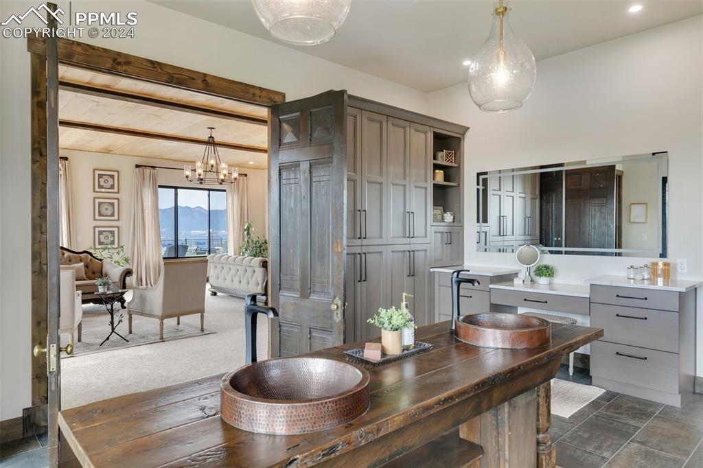 14040 Shadow Pines Road Colorado Springs, CO 80921 - Photo 25 of 50 a kitchen with a table and chairs