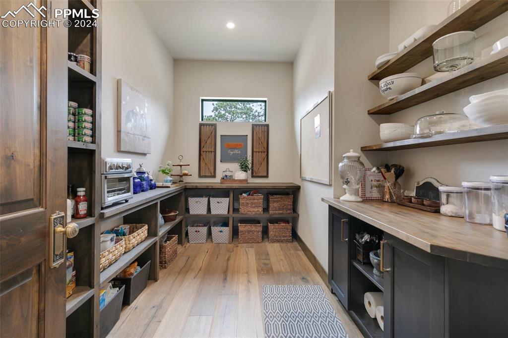 14040 Shadow Pines Road Colorado Springs, CO 80921 - Photo 33 of 50 a kitchen with granite countertop lots of counter top space and stainless steel appliances
