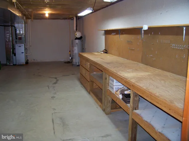 a view of a livingroom with an empty space and window