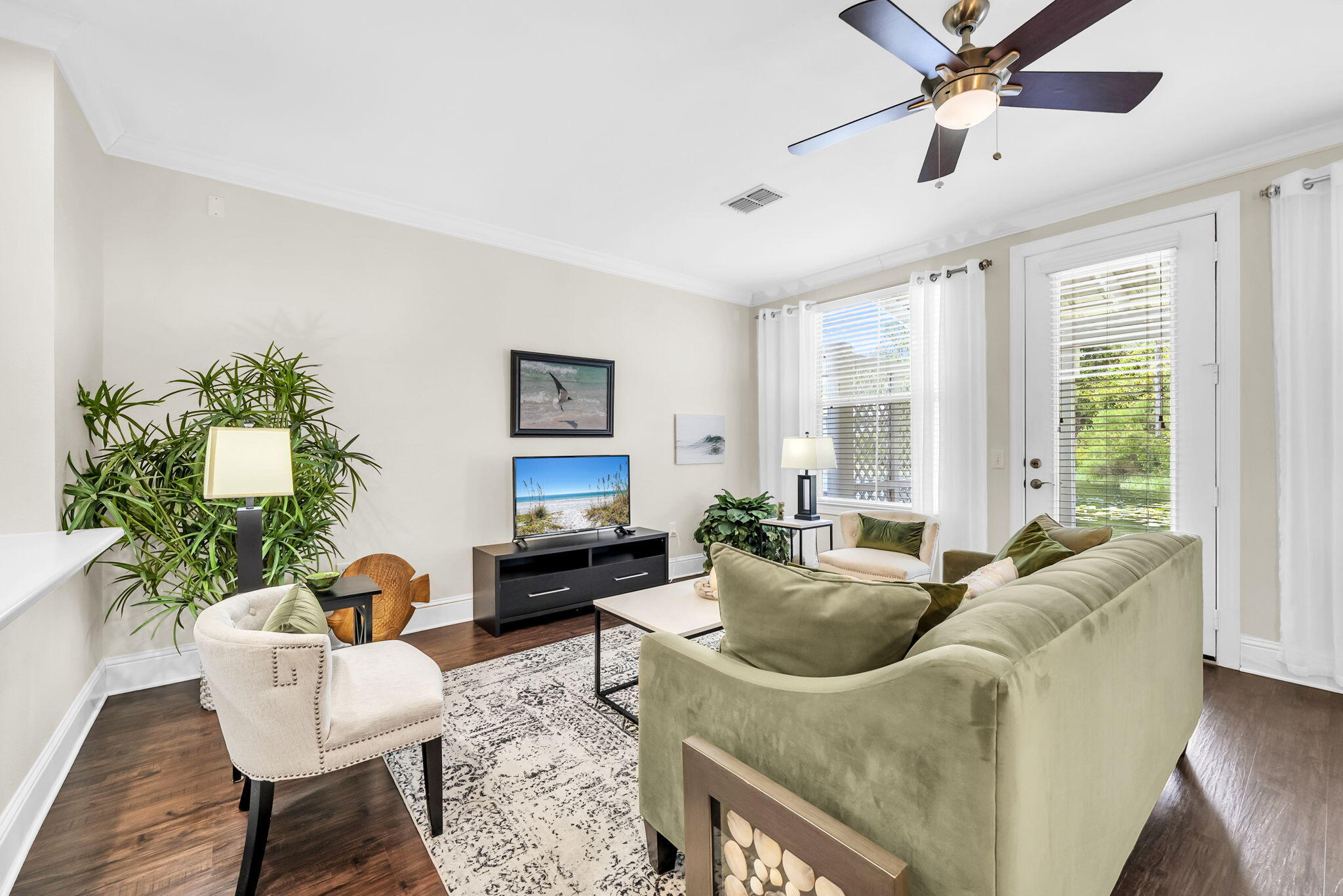159 Golden Eagle Court, Unit 3C Santa Rosa Beach, FL 32459 - Photo 12 of 34 a living room with furniture and a large window