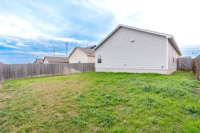 a view of a backyard with a garden