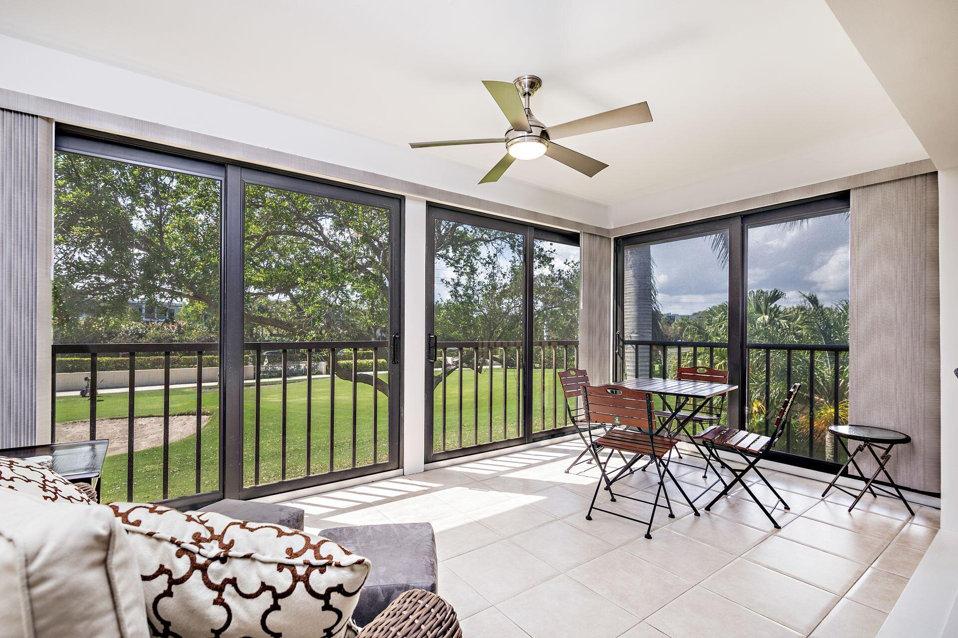 1002 Clubhouse Circle Jupiter, FL 33477 - Photo 14 of 34 1002 Family/Sunroom
