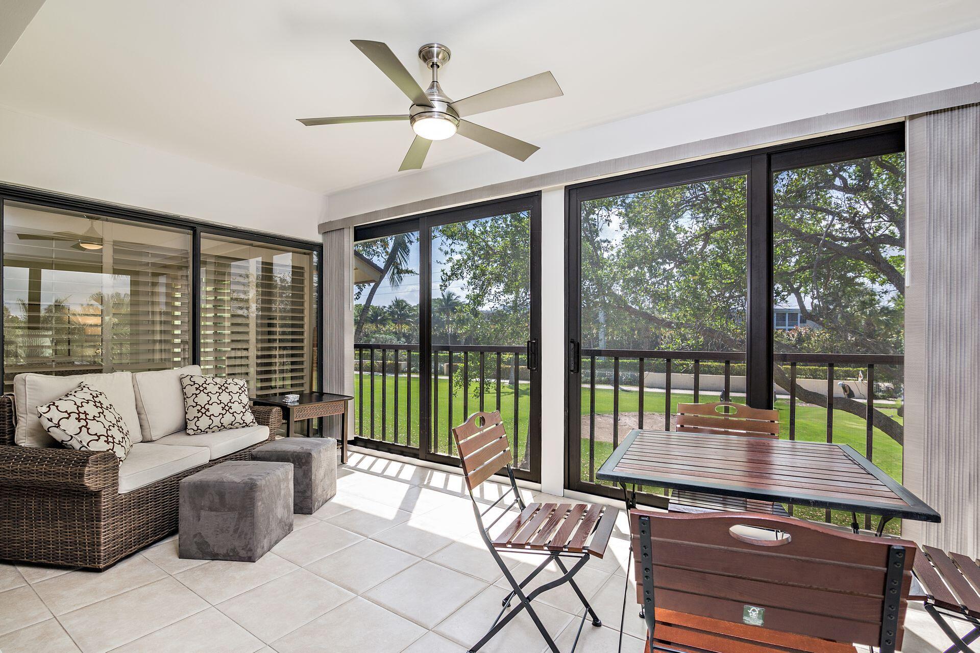 1002 Clubhouse Circle Jupiter, FL 33477 - Photo 15 of 34 1002 Family/Sunroom