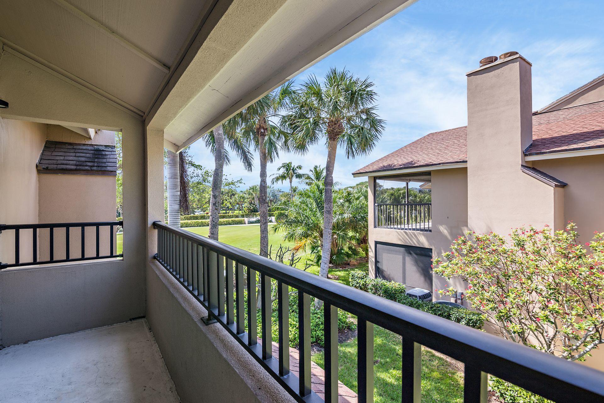 1002 Clubhouse Circle Jupiter, FL 33477 - Photo 17 of 34 1002 Dining Balcony