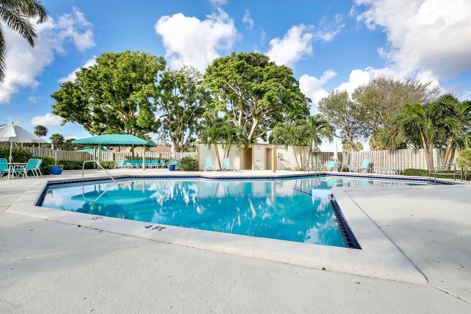 1002 Clubhouse Circle Jupiter, FL 33477 - Photo 22 of 34 1002 Pool