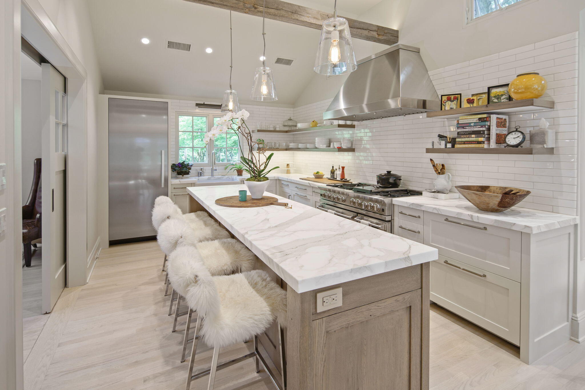 147 Fox Run Road New Canaan, CT 06840 - Photo 13 of 65 a kitchen with stainless steel appliances kitchen island granite countertop a sink and a refrigerator