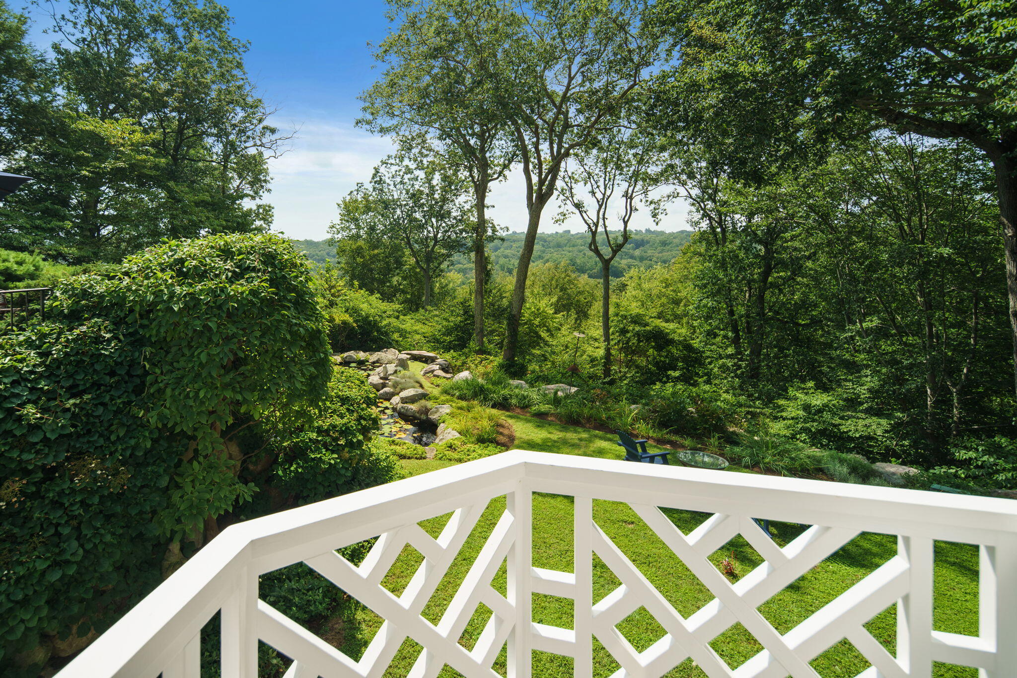 147 Fox Run Road New Canaan, CT 06840 - Photo 27 of 65 a view of outdoor space with deck and yard