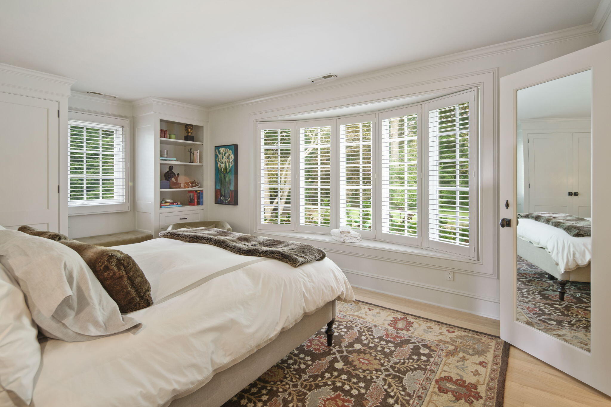 147 Fox Run Road New Canaan, CT 06840 - Photo 32 of 65 a spacious bedroom with a bed and a large window