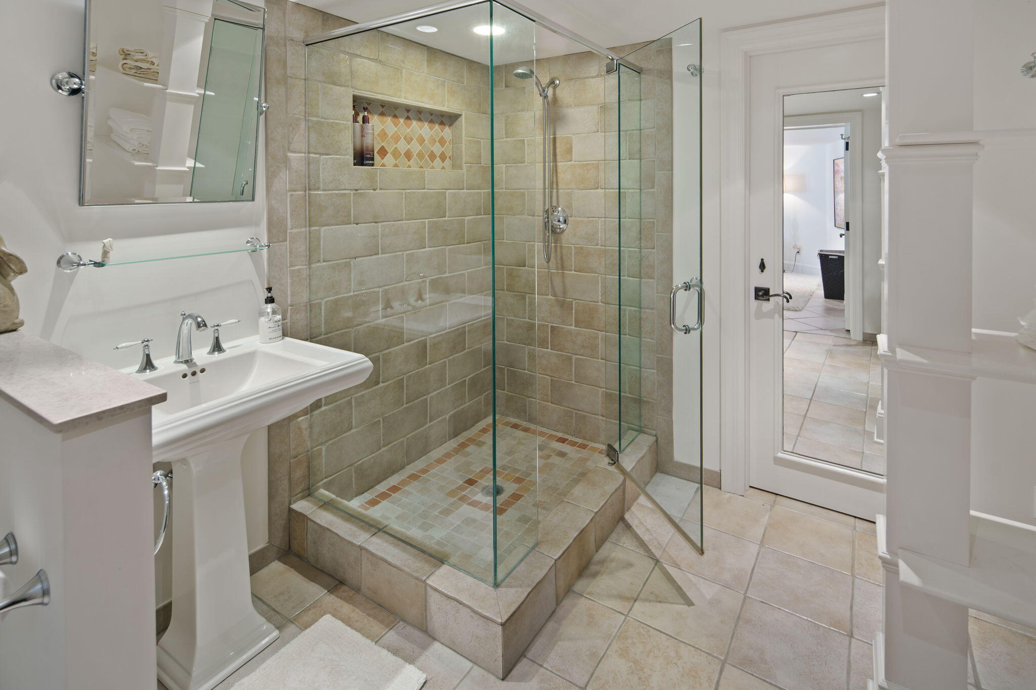 147 Fox Run Road New Canaan, CT 06840 - Photo 43 of 65 a bathroom with a shower and mirror