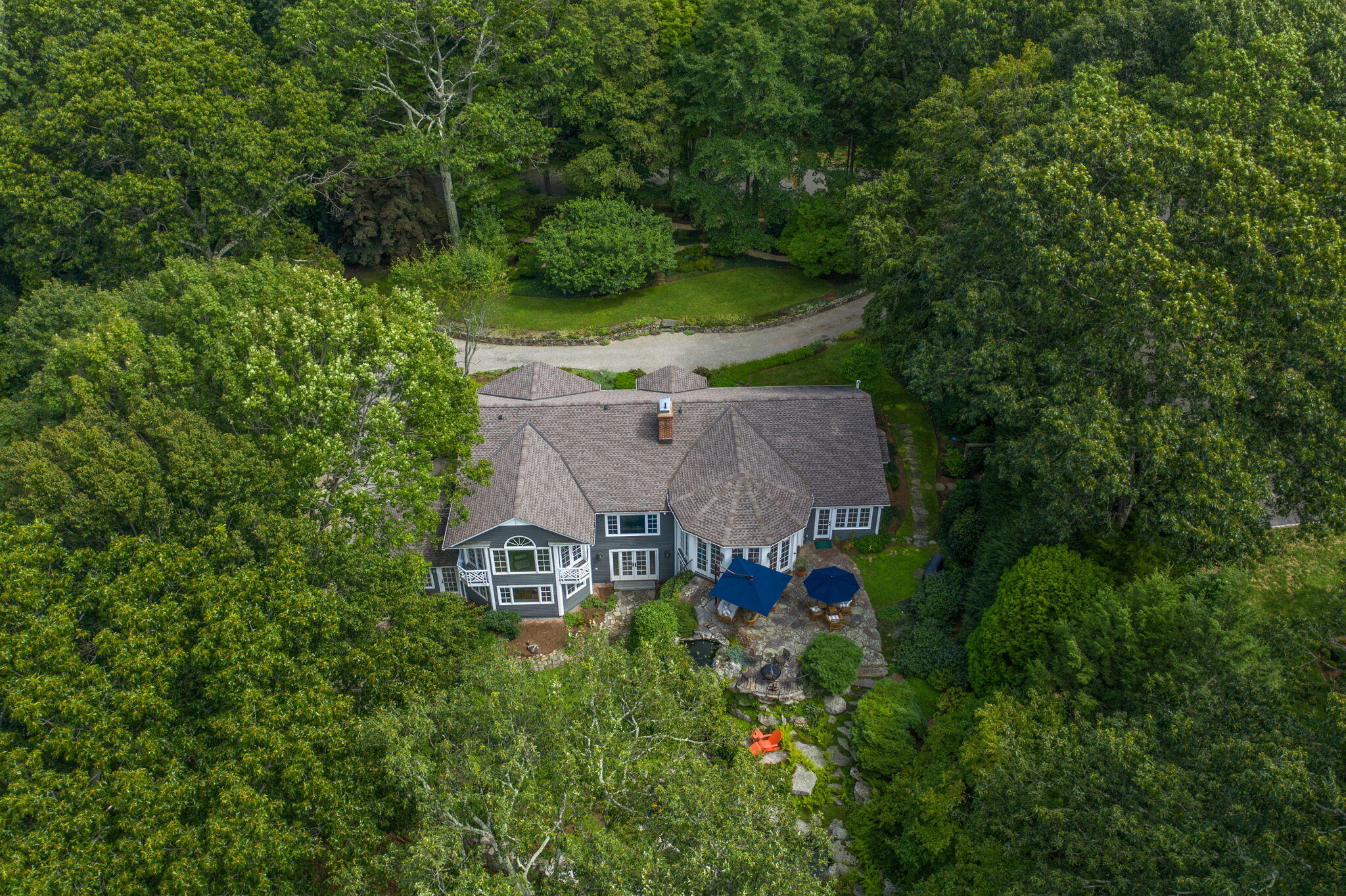 147 Fox Run Road New Canaan, CT 06840 - Photo 65 of 65 front view of a house with a yard