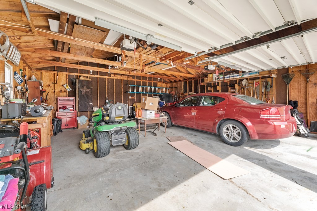 14846 Ellett Road Beloit, OH 44609 - Photo 29 of 32 two car garage with workbench