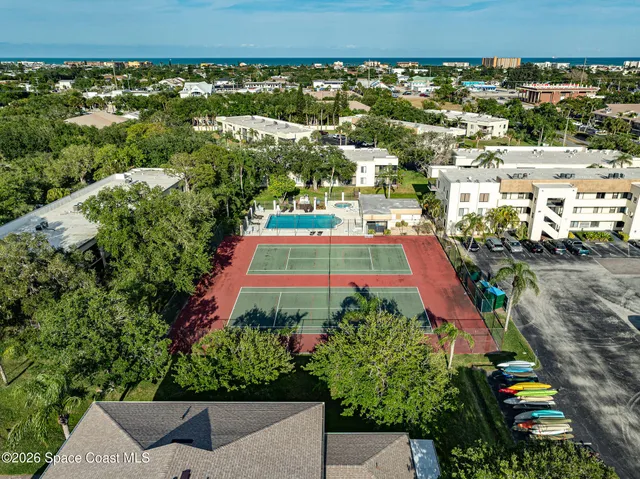 an aerial view of residential house with outdoor space