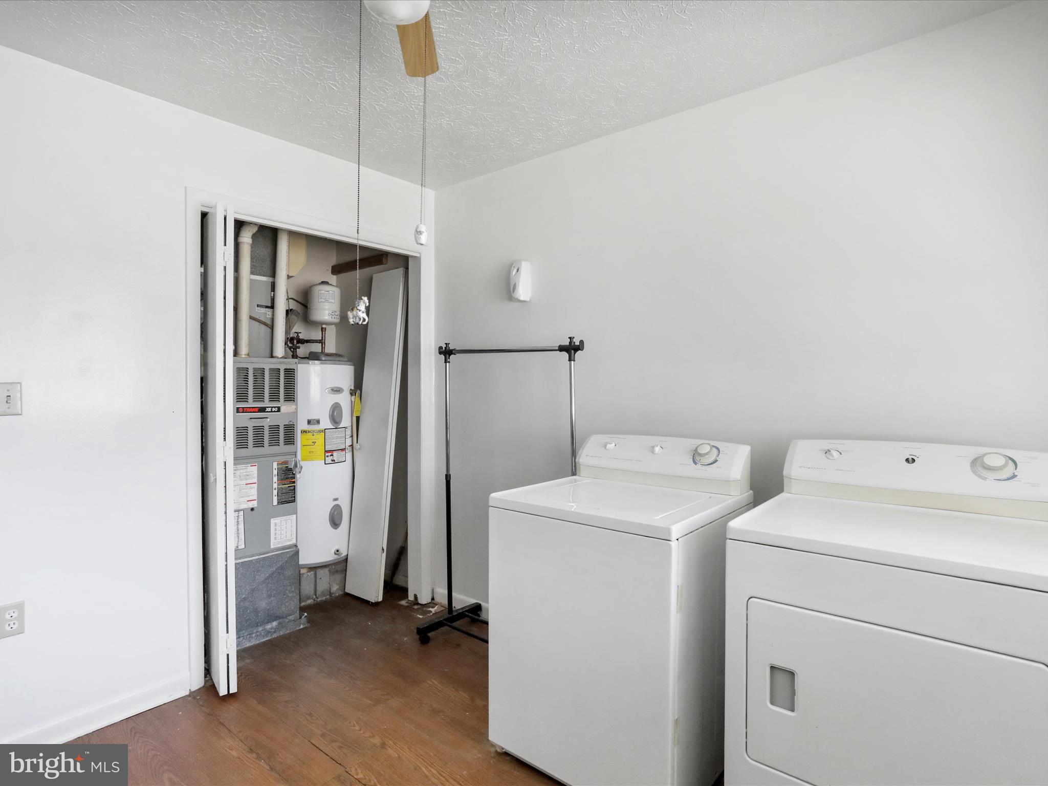 239 Chestnut Street Winchester, VA 22601 - Photo 23 of 35 a view of storage and utility room with washer and dryer