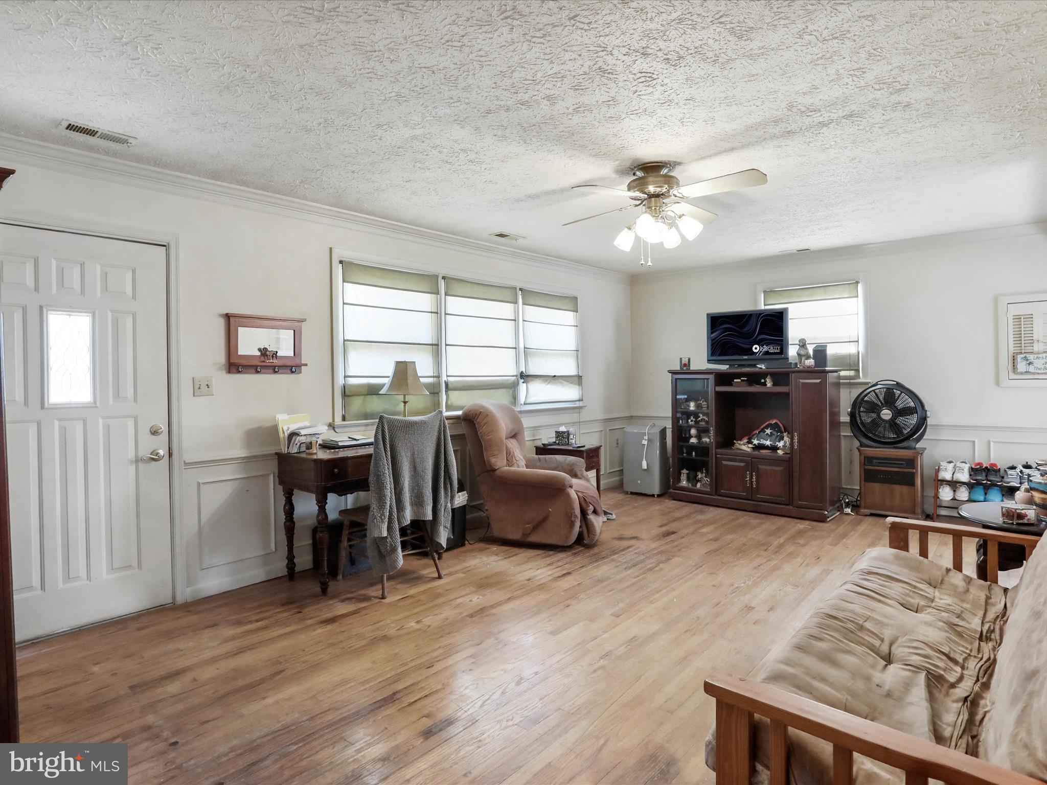239 Chestnut Street Winchester, VA 22601 - Photo 25 of 35 a living room with furniture and a flat screen tv