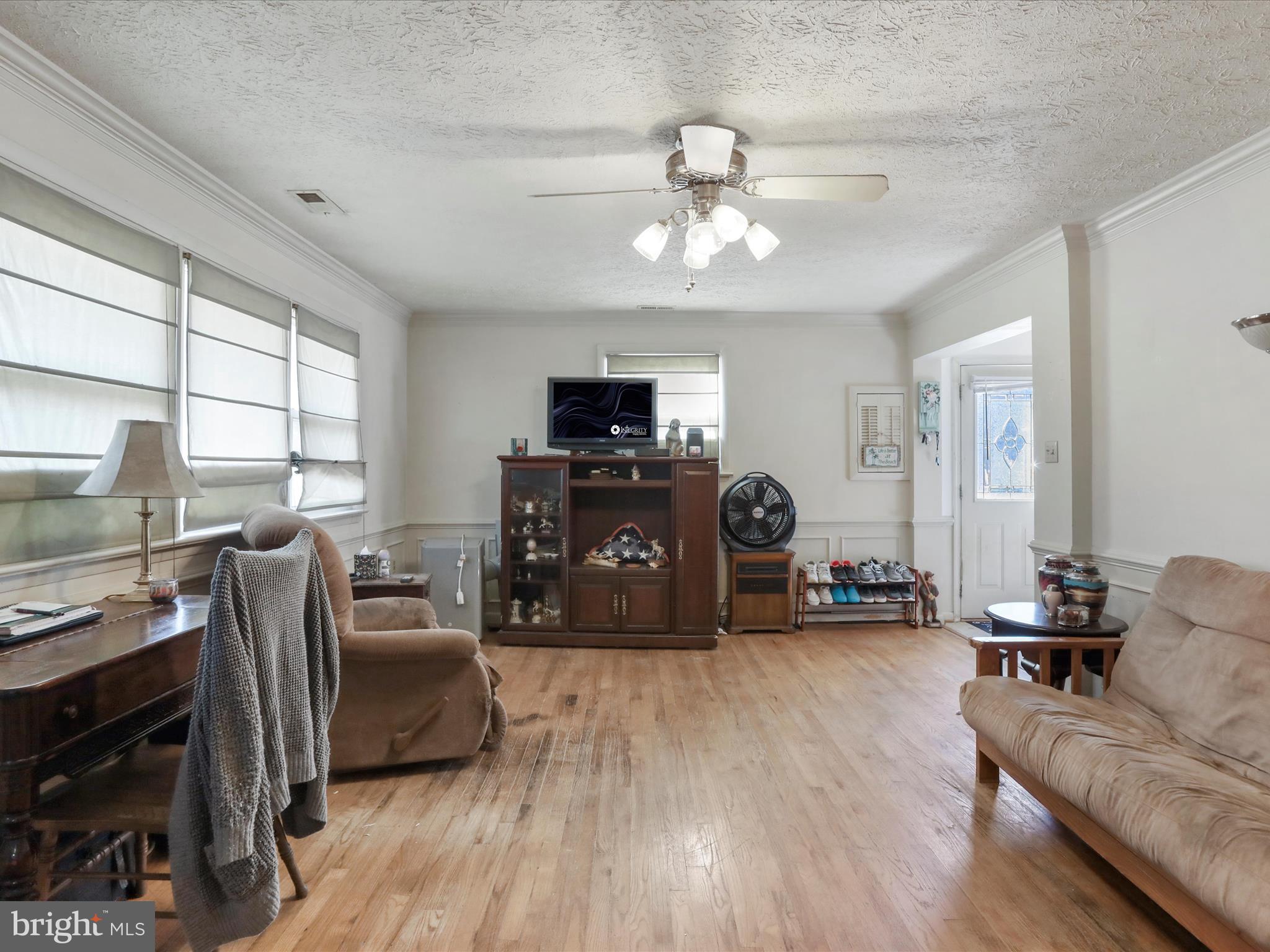 239 Chestnut Street Winchester, VA 22601 - Photo 26 of 35 a living room with furniture and a flat screen tv