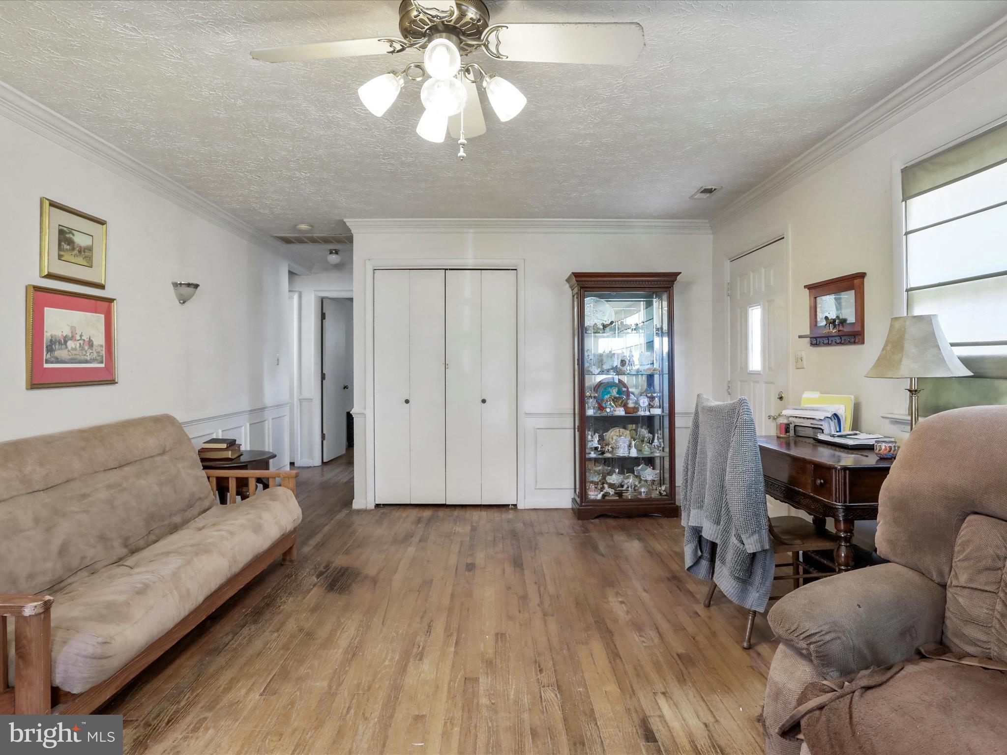 239 Chestnut Street Winchester, VA 22601 - Photo 29 of 35 a living room with furniture and wooden floor