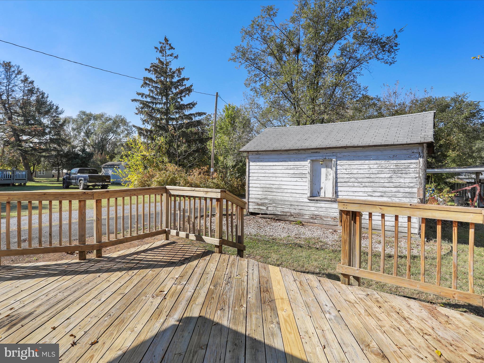 239 Chestnut Street Winchester, VA 22601 - Photo 31 of 35 a view of a wooden deck with a yard