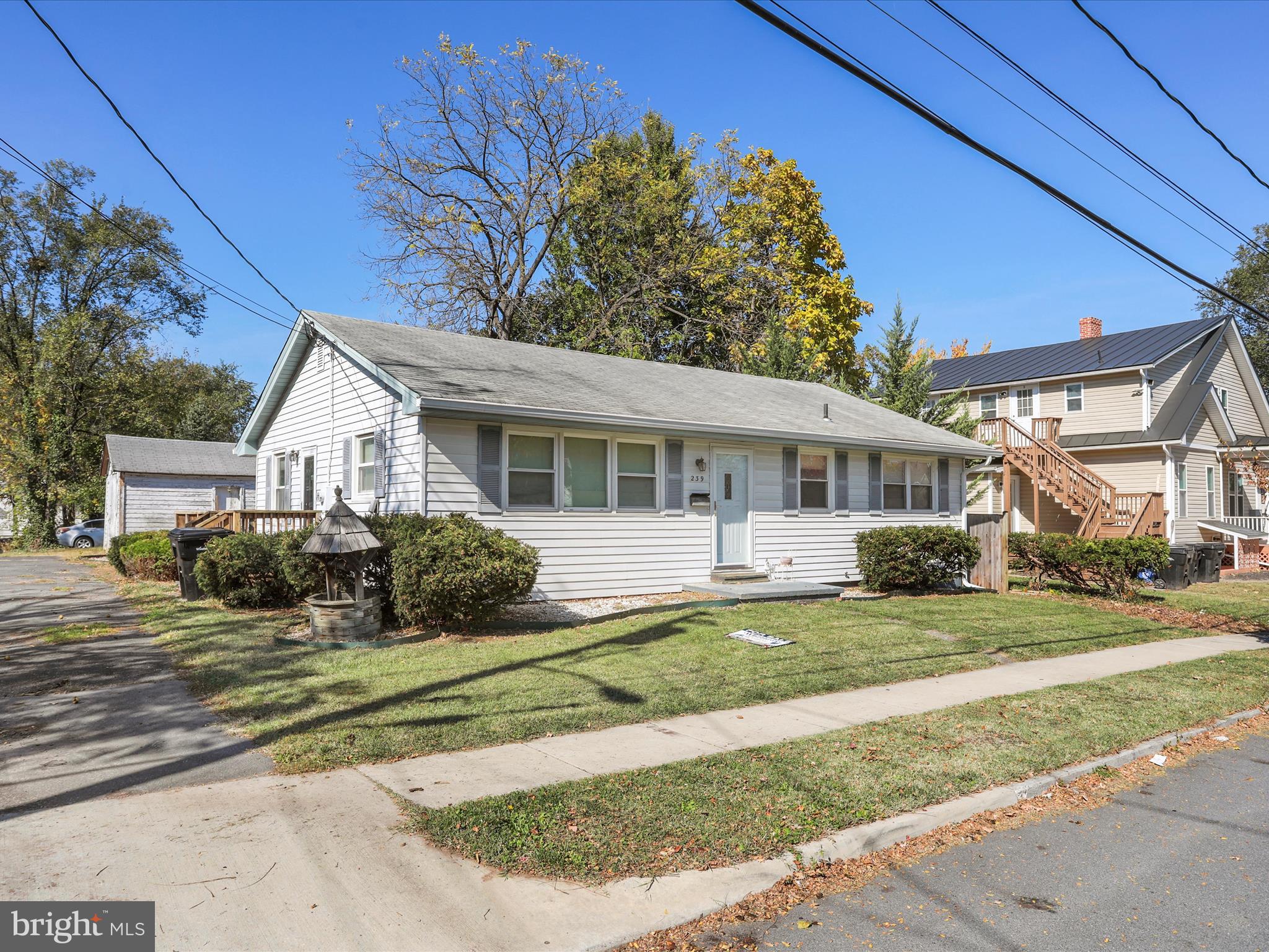 239 Chestnut Street Winchester, VA 22601 - Photo 5 of 35 a front view of a house with a yard