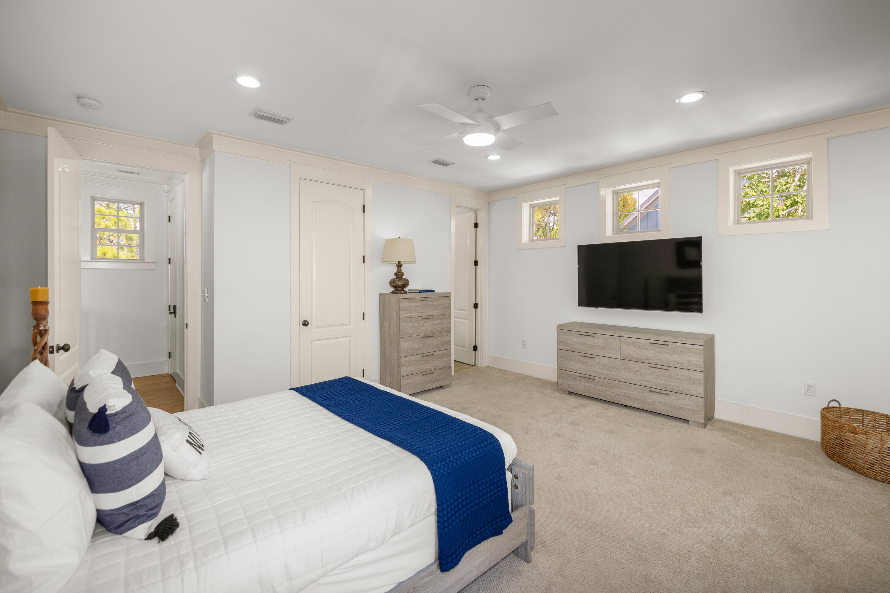 402 Redbud Lane Inlet Beach, FL 32461 - Photo 24 of 44 a bedroom with a bed and a flat screen tv