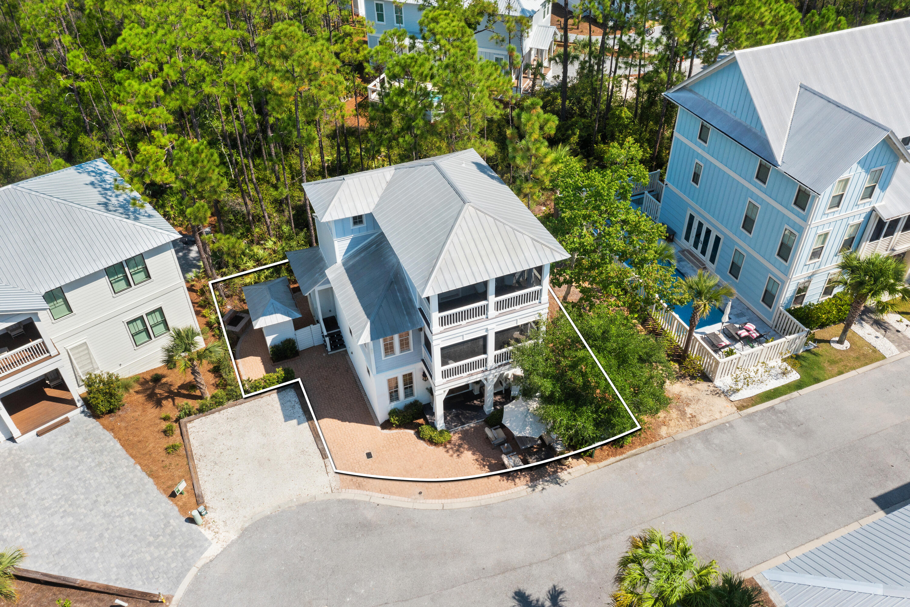 402 Redbud Lane Inlet Beach, FL 32461 - Photo 31 of 44 an aerial view of a house with a yard and garage