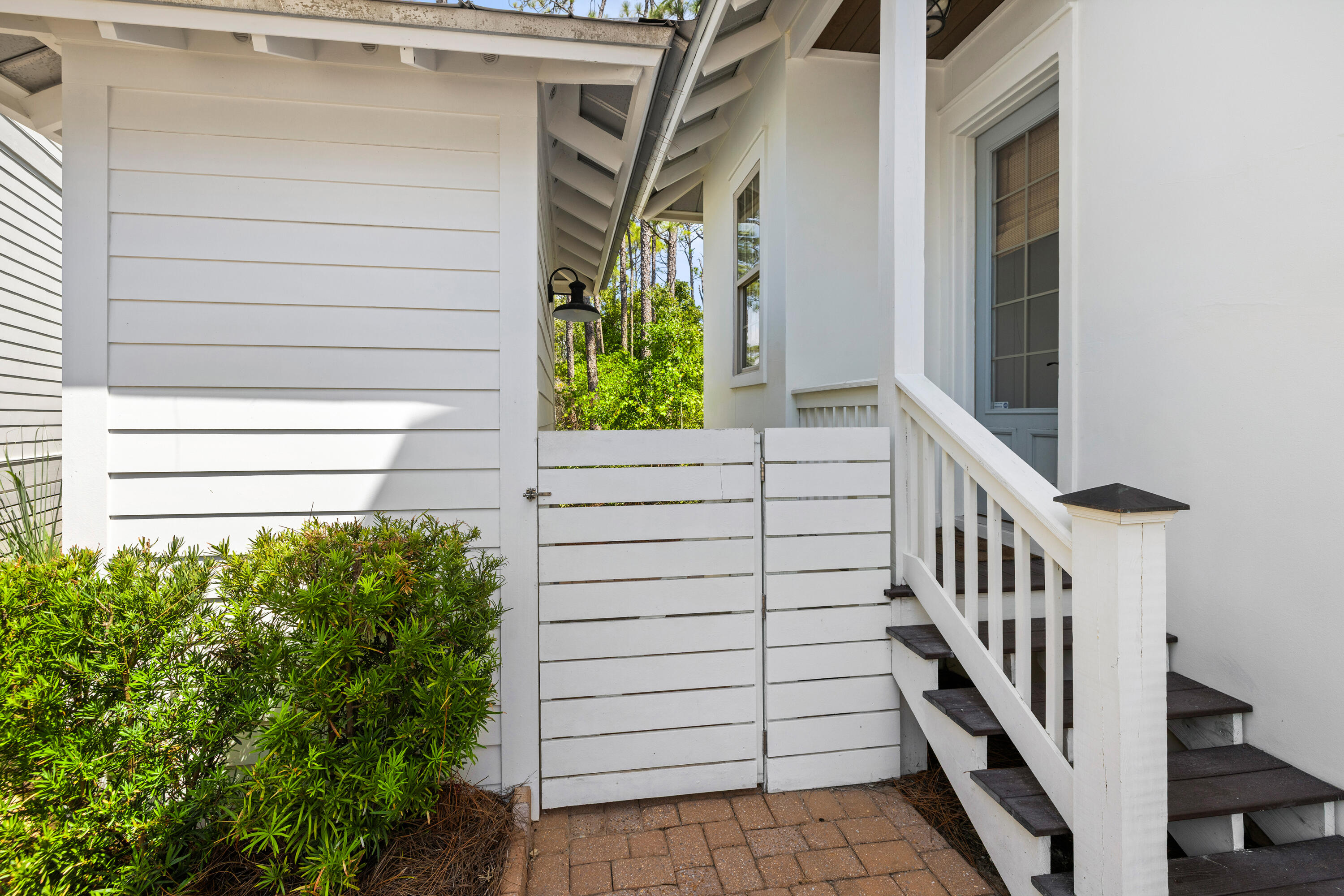 402 Redbud Lane Inlet Beach, FL 32461 - Photo 32 of 44 a view of front door and potted plants