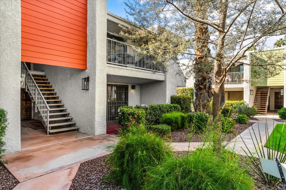 3155 Ramon Road, Unit 312 Palm Springs, CA 92264 - Photo 2 of 34 a view of a house with a yard