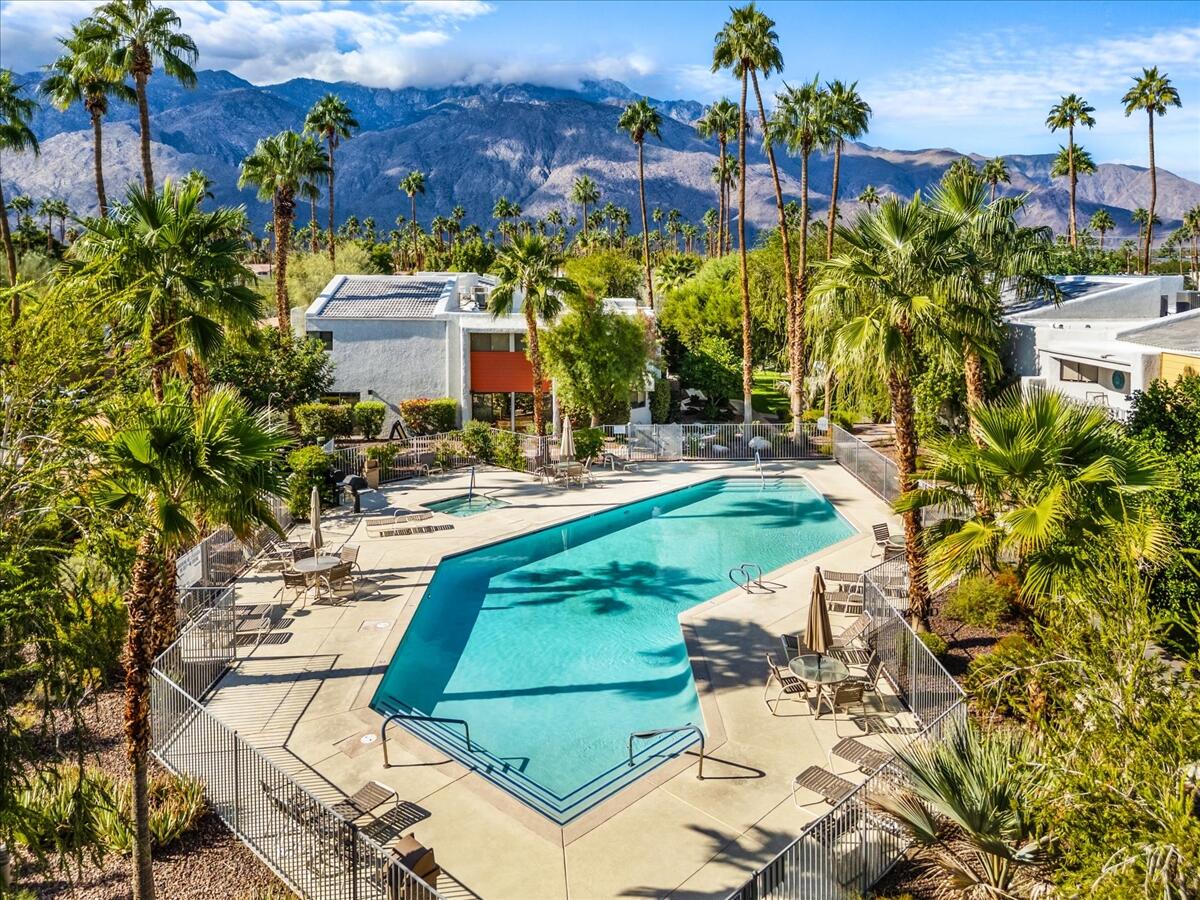 3155 Ramon Road, Unit 312 Palm Springs, CA 92264 - Photo 29 of 34 a view of a swimming pool with a patio
