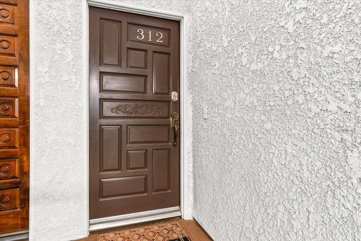 3155 Ramon Road, Unit 312 Palm Springs, CA 92264 - Photo 3 of 34 a view of front door