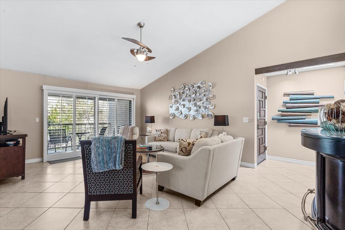3155 Ramon Road, Unit 312 Palm Springs, CA 92264 - Photo 5 of 34 a living room with furniture and a large window