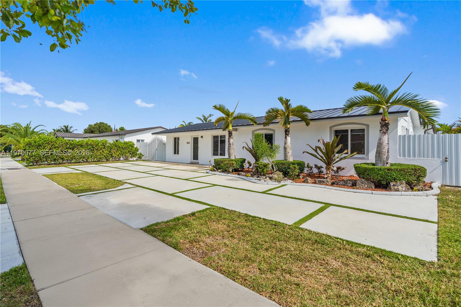 5103 Southwest 128th Place Miami, FL 33175 - Photo 3 of 38 a view of house with outdoor space and swimming pool
