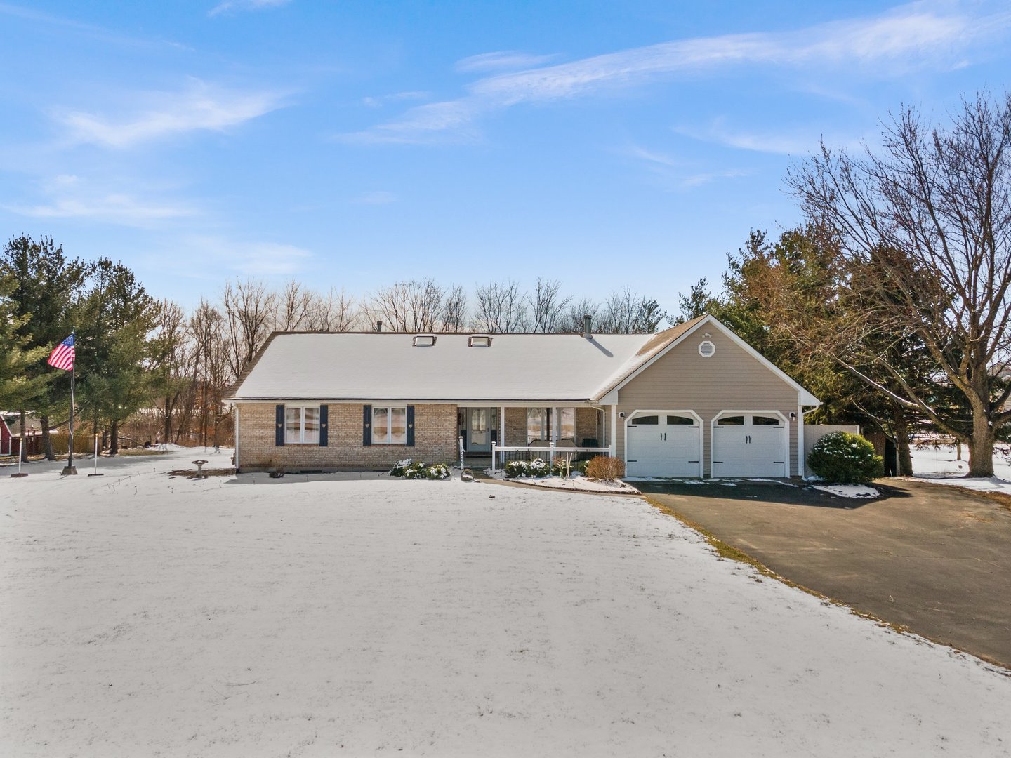 front view of a house next to a road