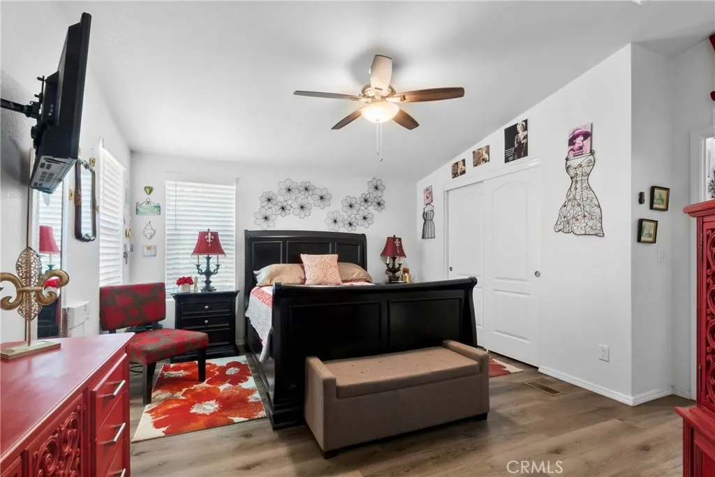 3700 Buchanan Street, Unit 108 Riverside, CA 92503 - Photo 15 of 31 a living room with furniture and a flat screen tv
