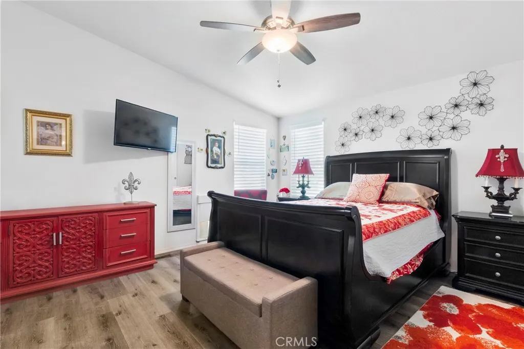 3700 Buchanan Street, Unit 108 Riverside, CA 92503 - Photo 16 of 31 a bedroom with a bed and flat screen tv